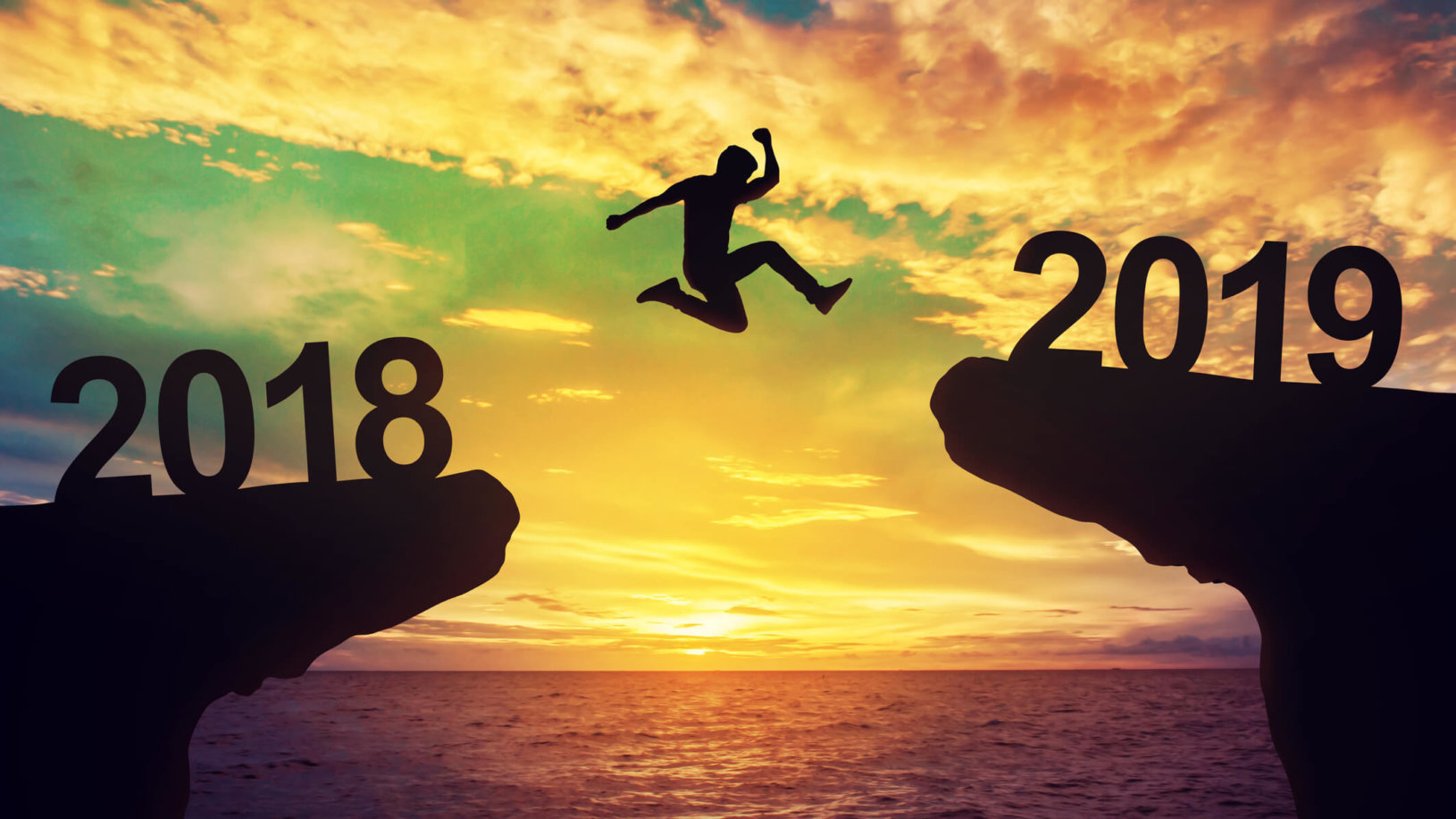 Man jumping from a ledge labeled 2018 to a ledge labeled 2019