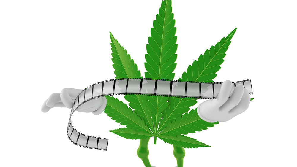 Animated scene of a cannabis leaf with hands holding a strip of film