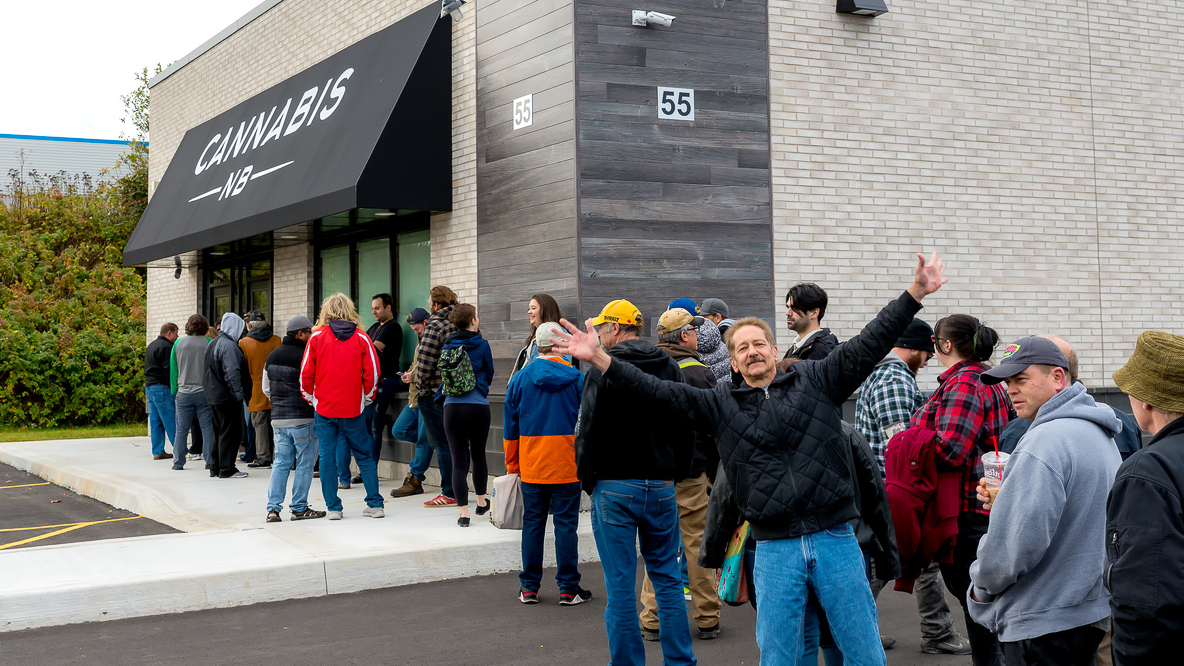 Saint John, New Brunswick, Canada - October 17, 2018: People line up to purchase cannabis legally from a Cannabis NB store on the first day of legalization in Canada.