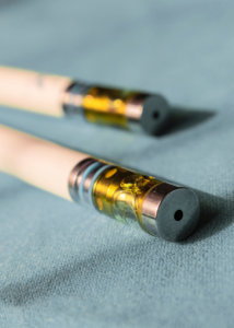 Close up shot of two disposable vape pens