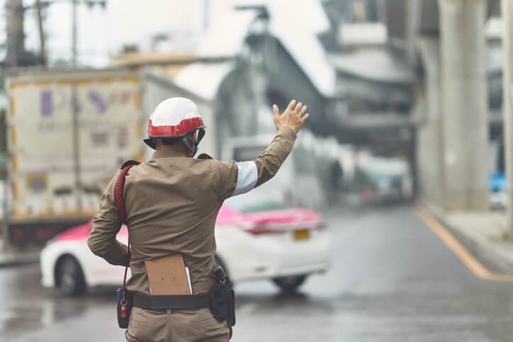 Thai traffic policeman in working action
