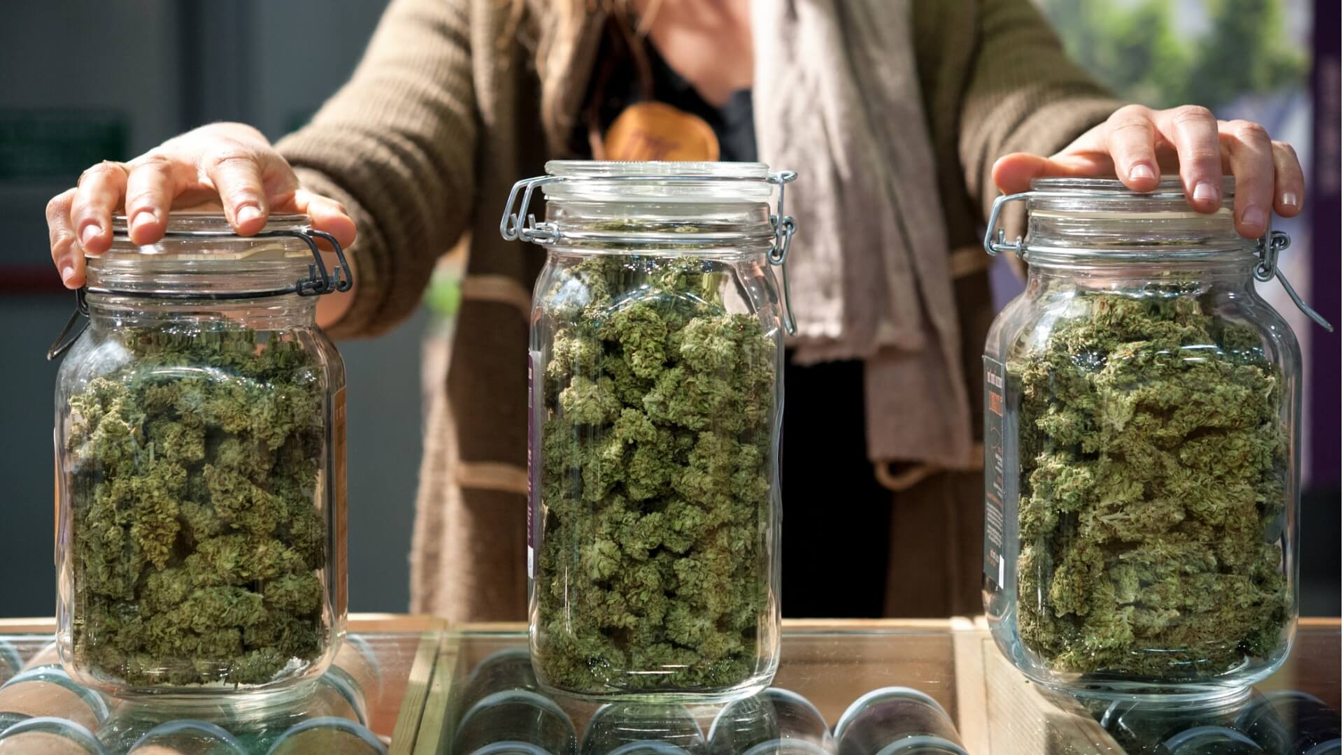 glass jar full of cannabis green wednesday