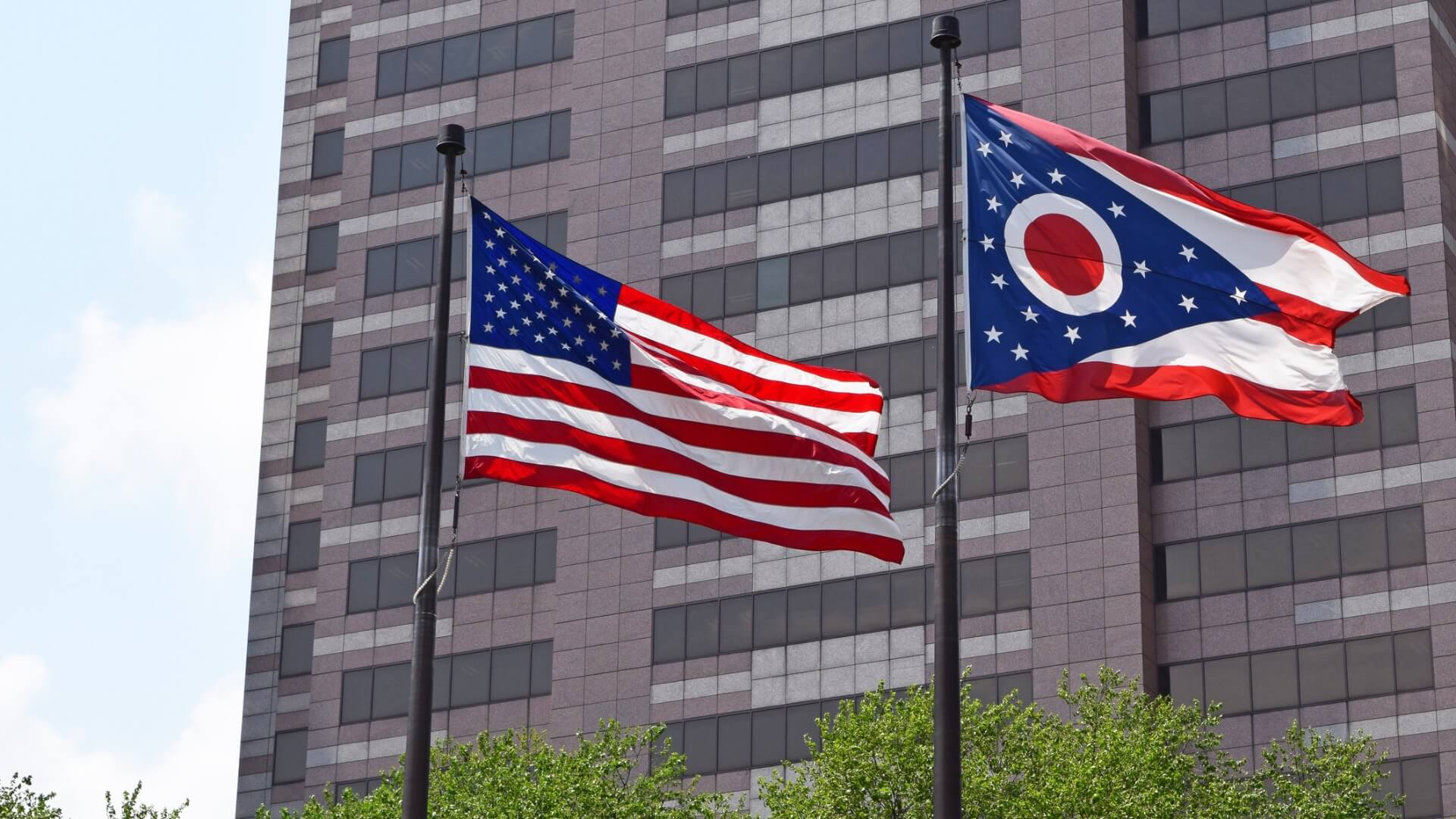 US flag flying next to the Ohio state flag