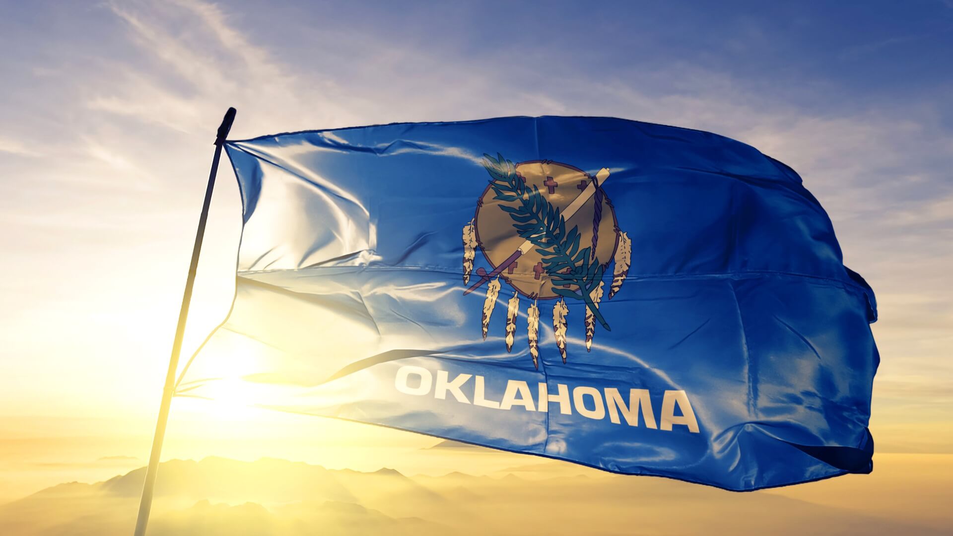 Oklahoma state flag waving in the wind