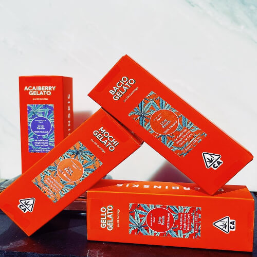 Sherbinskis Gelato products in orange packaging