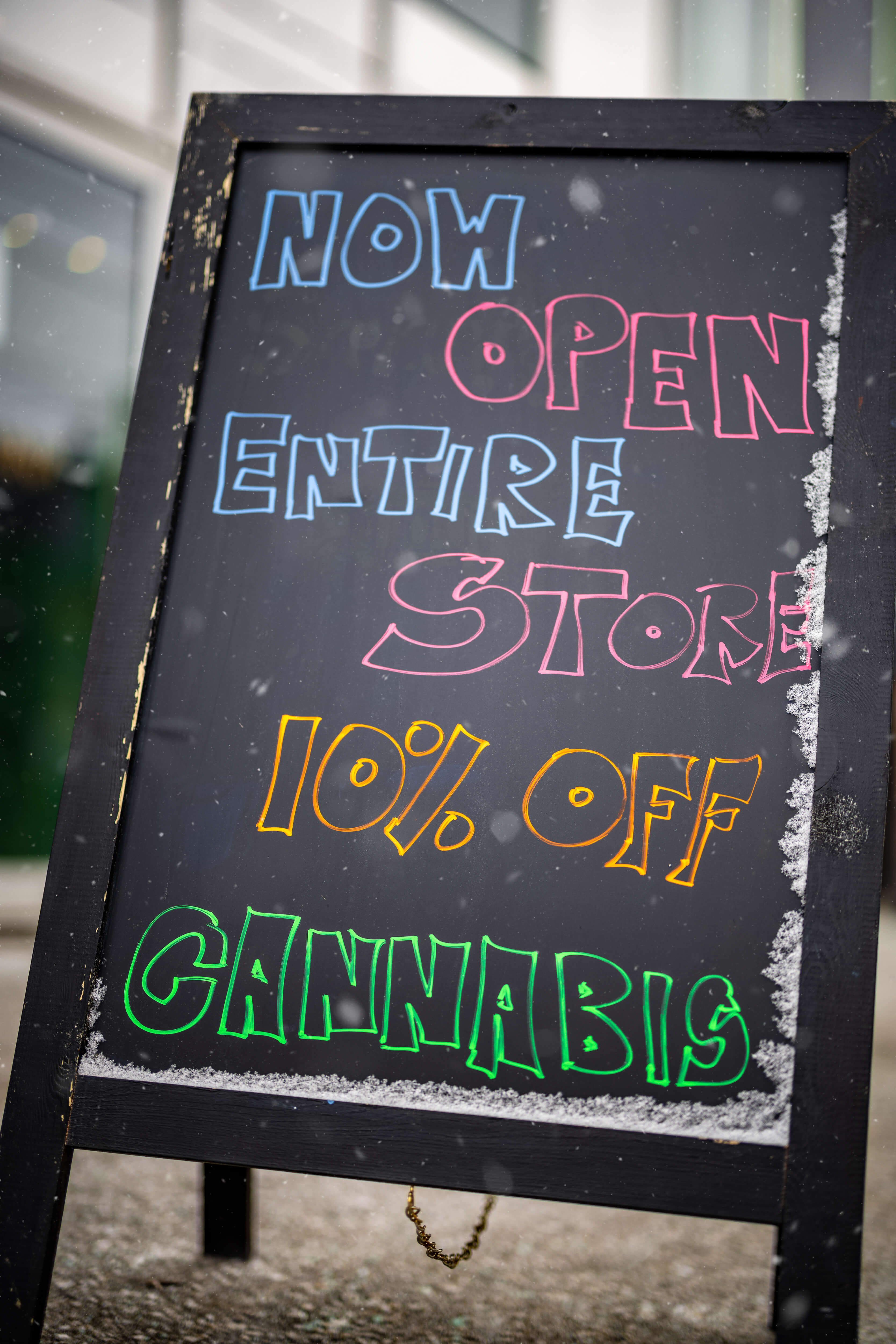 A sign advertising a sale of 10% off all cannabis in store