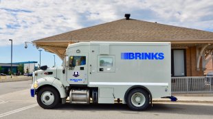 A Brinks armored vehicle transferring cash