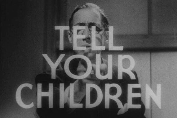 Black and white screen shot of the Reefer Madness movie with the words, "Tell Your Children"