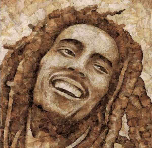 a portrait of Bob Marley created with scraps of roach paper